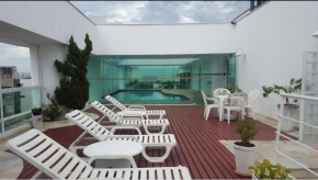 Apartamento Flat pé na areia com piscina aquecida